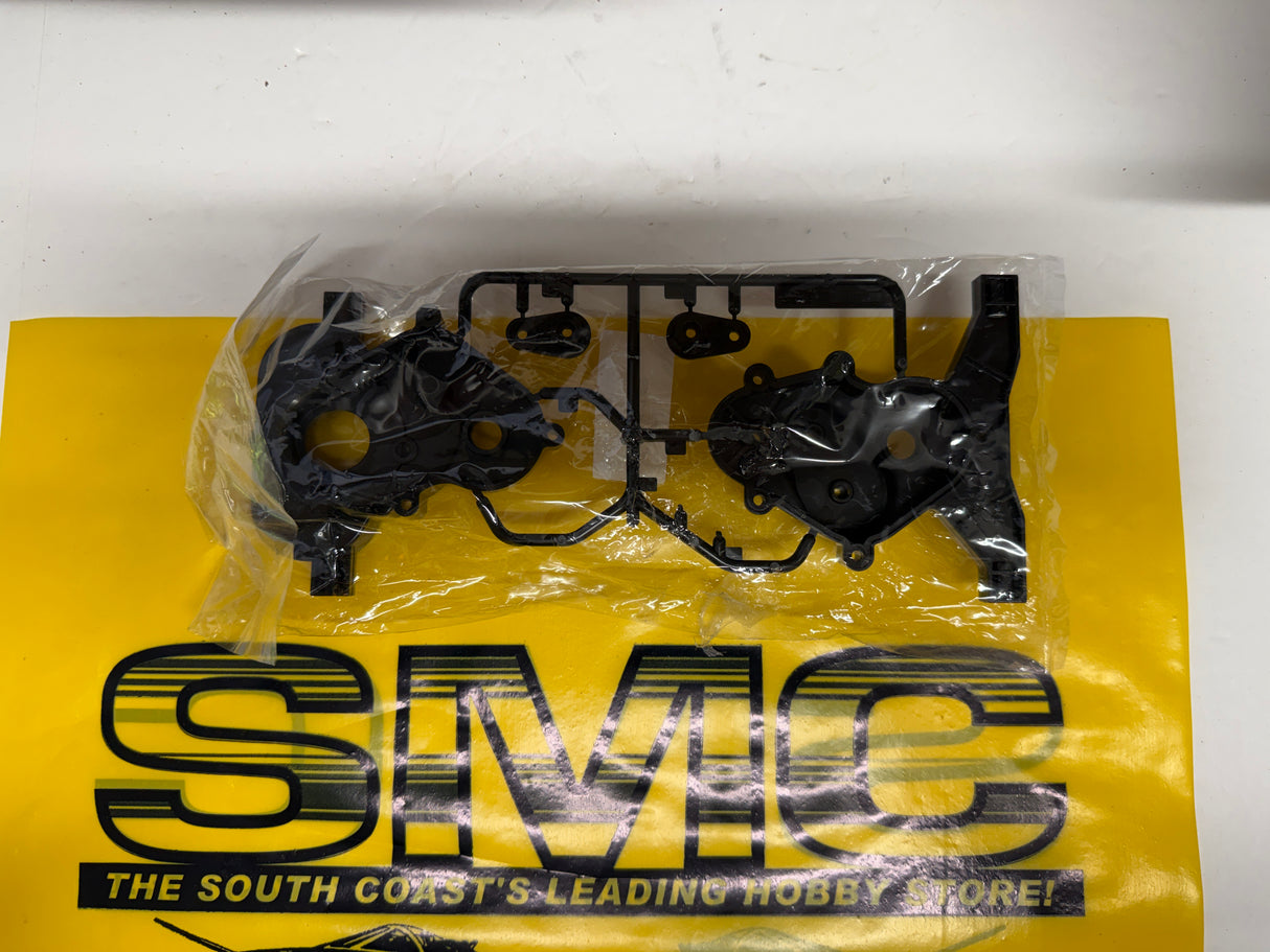 Tamiya A Parts (Gear Case) 58256 Juggernaut 2/Agrios/TXT-1 0005759 (Box 41) (Missing 2x Small Bushings)