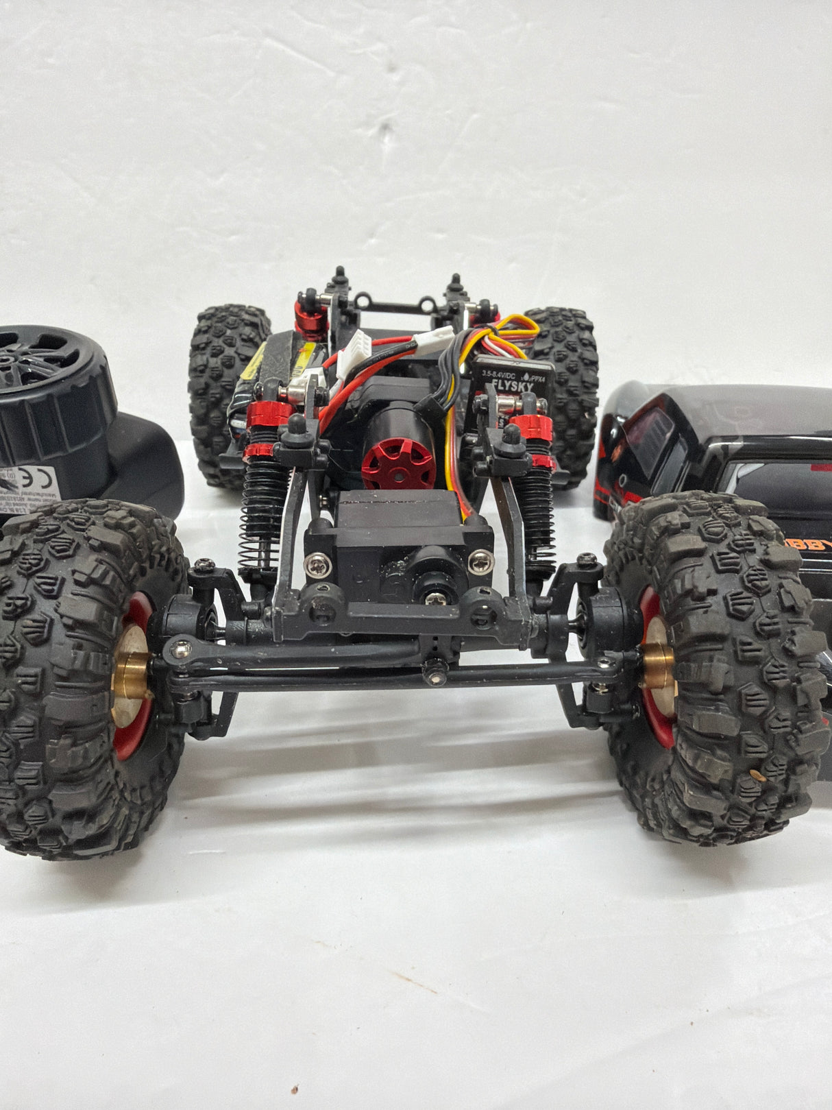 Second Hand Brushless Rock crawler 1:18 with Radio and Battery Black body shell