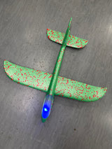 LED Hand Launch Glider in green with red dots lights activate on impact