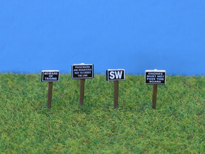 Trackside signs with printed notices (4)