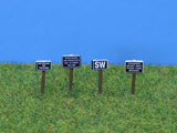 Trackside signs with printed notices (4)