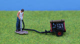 Man with drill & compressor