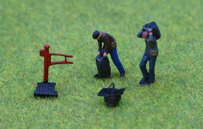 Coal men & scales