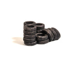 Car Tyres piled & leaning