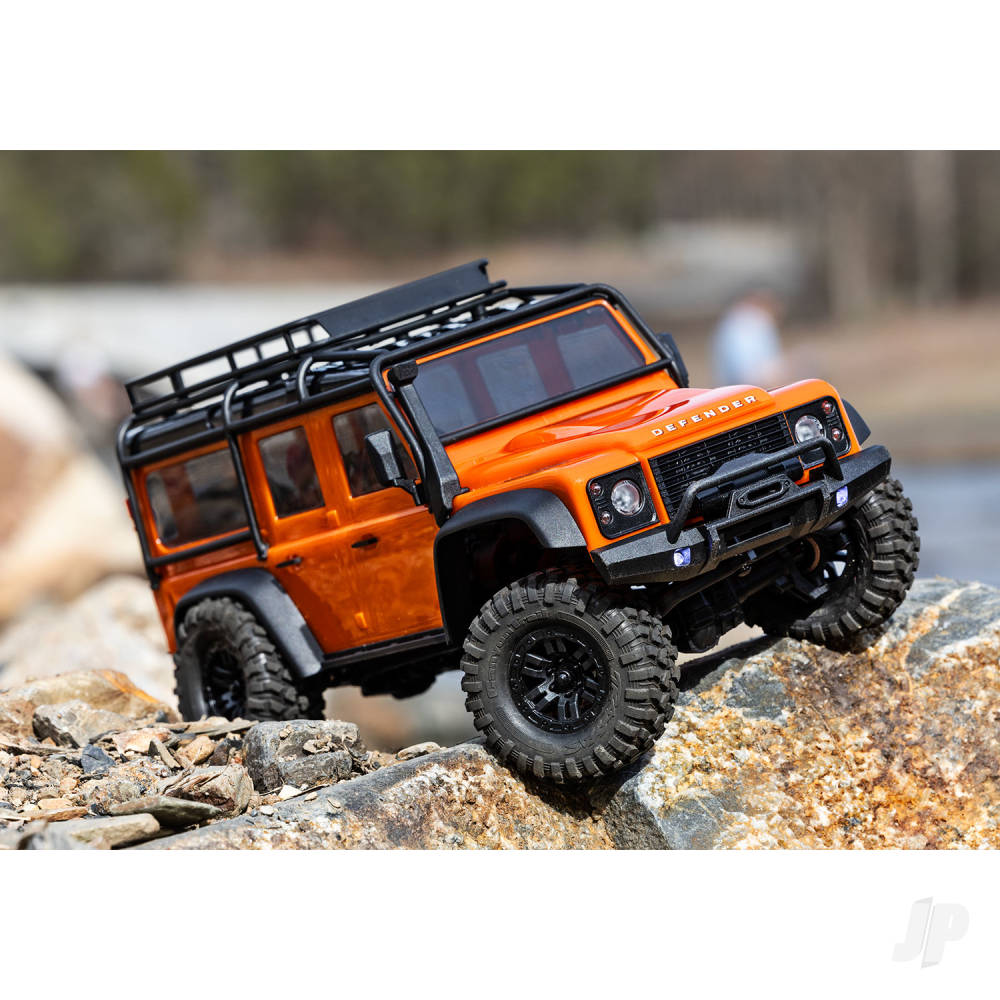 Traxxas TRX-4m Land Rover Defender 1:18 4X4 Electric Trail Crawler - Orange (+ TQ 2-ch/ ECM-2.5/ Titan 87T/750mAh 2-Cell LiPo/USB Charger)